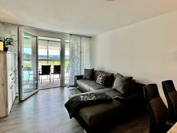 Couch, Furniture, Comfort, Living Room, Interior Design, Wood, Shade, Flooring, Floor, Pillow