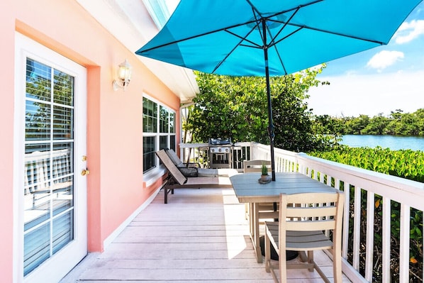 The Ringling Bungalow's private deck overlooks Heron Lagoon