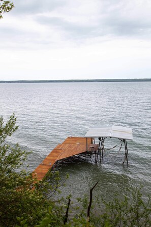 Private lakeside access for kayaking, swimming, or skipping stones.