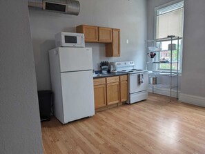 Our kitchen is cozy, where you can enjoy cooking delicious food!