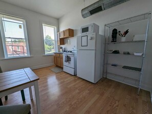Our kitchen is cozy, where you can enjoy cooking delicious food!