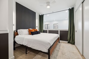 King bed in the upstairs loft