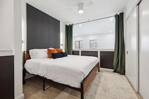 King bed in the upstairs loft