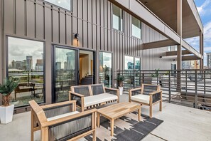 Private balcony with outdoor furniture and  downtown skyline VIEWS!