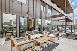 Private balcony with outdoor furniture and downtown skyline VIEWS!