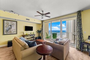 Ocean Front Living Area with Flat Screen TV, Sleeper Sofa and Private Balcony Access