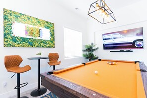 Pool Table, 70-Inch Samsung Smart TV,
Samsung Sound System,
High Chairs,