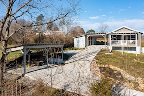 Long driveway with covered parking