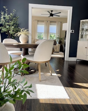 Dining room opens to the family room. Inviting for larger groups