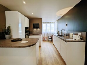 Pièce à vivre salon, salle à manger et cuisine