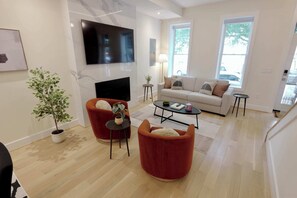 Spacious living room with Smart tv to relax after a full day of exploring!