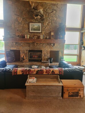 Living Room with Fireplace and Large windows for an incredible view