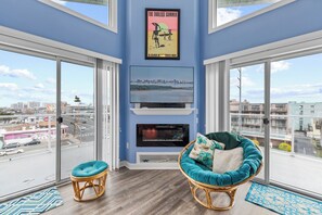 Soaring Ceilings and abundant Natural Light - *Fireplace is Decorative Only!*