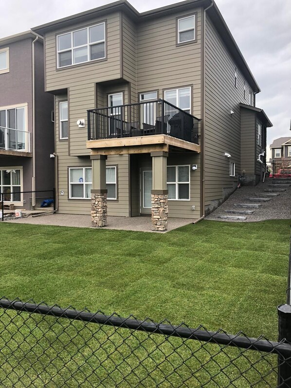Backyard and Entrance to Suite