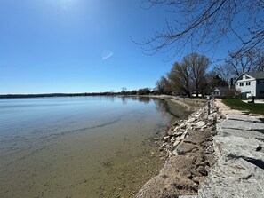 Temperate water with smooth sandy bottom, just outside the door!