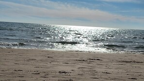 Sunlight dancing on the waves at Sable Beach—pure magic! ✨🌊☀️