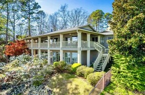Gorgeous landscaping and fully covered decks to keep you cool relaxing!