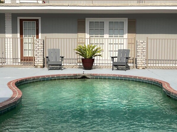 Safe, quiet, and peaceful, the central courtyard has the pool and sun loungers