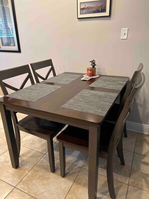 Dining area with table and space for four