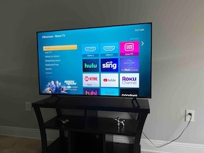 57" smart TV with Roku