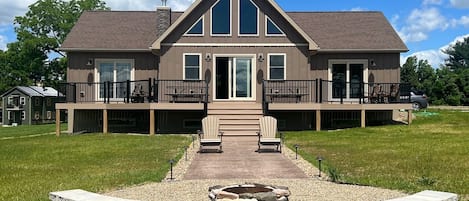 rear of house with firepit