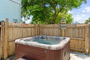 Relax in the private hot tub with a margarita in hand after enjoying the beach