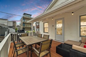 Spacious deck with 6-person dining table, outdoor sectional, and grill!