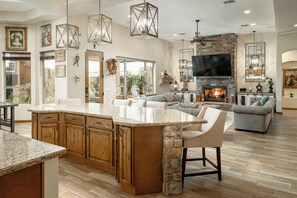 Spacious kitchen opens to a inviting living area