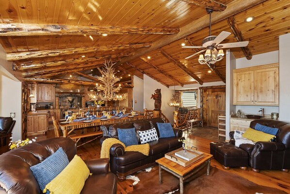 Beautiful rustic timber ceilings and lake views from main living area