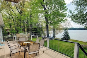 Experience the ultimate deck dining experience with comfortable seating and bar area.