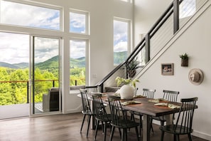 Your dinner backdrop? Endless trees, mountain silhouettes, and golden hour light. Yes, please.