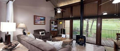 Living Room with Sleeper Sofa, Fireplace and Large Deck