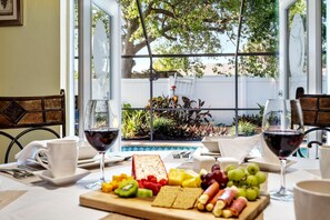  Relax in this serene fully screened in pool  right off the dining room
