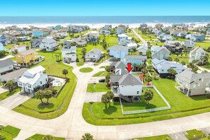 Load up the beach gear and take a stroll through the neighborhood to the surf and sand