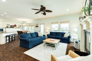 Bright and airy living area with wall of windows