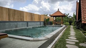 gazebo beside on the pool 