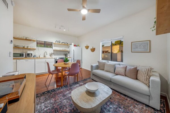 Living room, dining area, and kitchen (sleeper sofa comfortable sleeps 2)