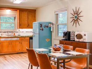 The retro, meticulous restored kitchen is stocked with every thing you need for great meals.