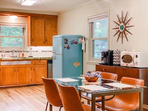 The retro, meticulous restored kitchen is stocked with every thing you need for great meals.