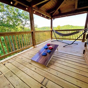 Fun Deck equipped with Cornhole Board Game