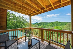 Game room deck with lounge area to relax, read, or just soak in the views