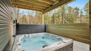 Our hot tub is under the deck providing privacy and enough room for 7 people to enjoy a soak.