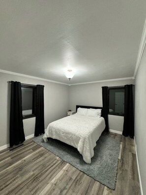 Light Gray Main Floor Queen Bedroom