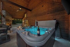 Enjoy a glass of wine in the hot tub.