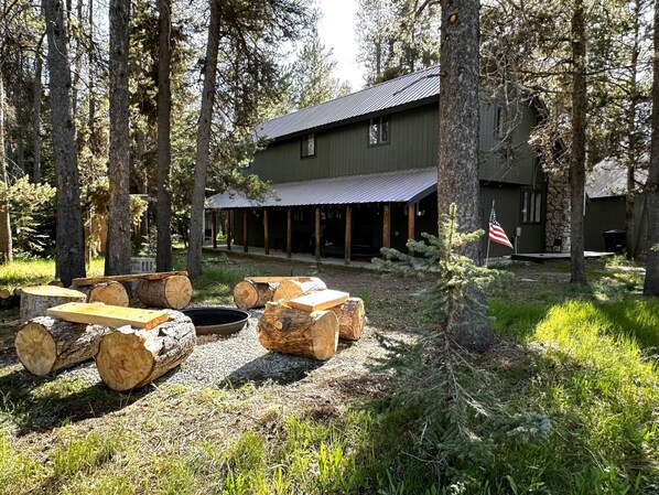 Custom Benches around the outdoor Fire Pit to gather with Family and Friends