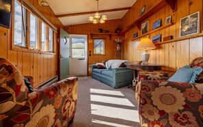 The inviting living room has comfortable seating.