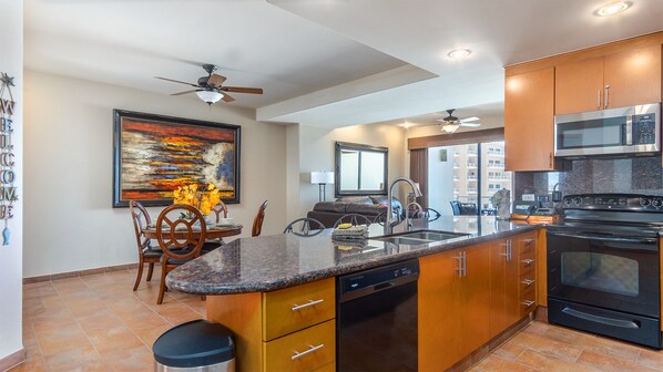 This kitchen counter separates kitchen from dining area.