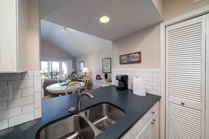 Pass through to dining area and pantry with laundry