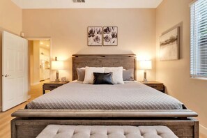 Spacious bedroom with comfy bed.