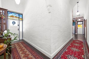 Main hallway leading to lounge room and kitchen